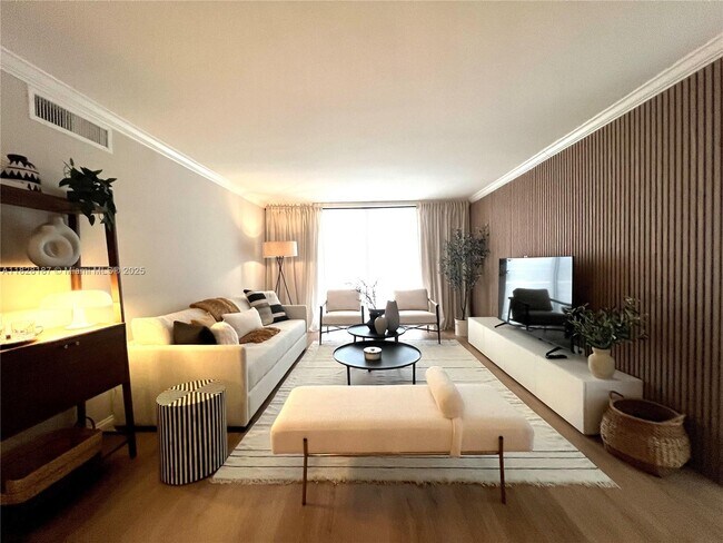 Building Photo - 5555 Collins Ave