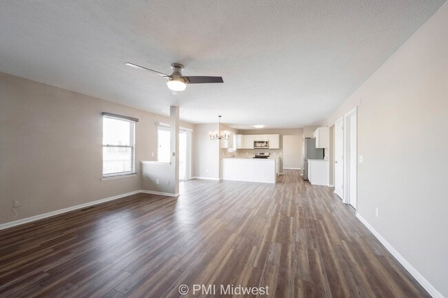 Building Photo - "Spacious 4-Bedroom Gem with Finished Base...