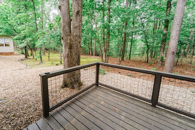 Building Photo - Charming 4 bedroom, 3 bathroom with lots of outdoor living space.