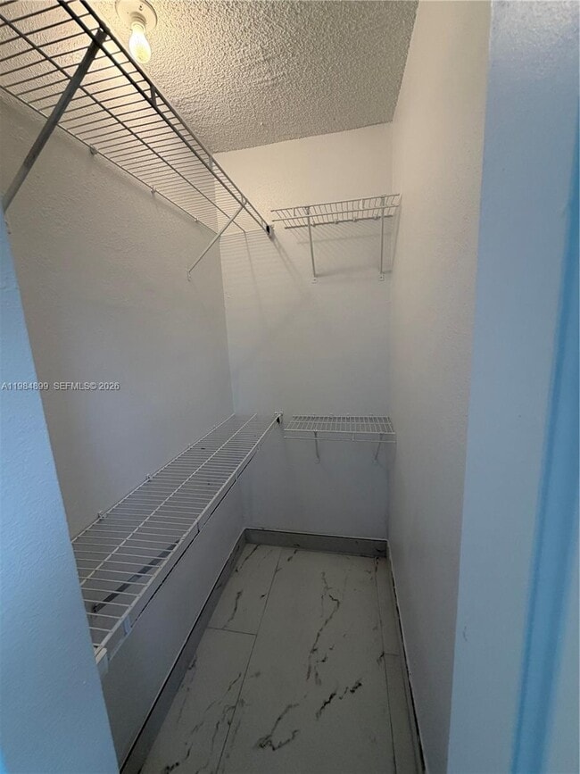 Building Photo - 9365 Fontainebleau Blvd