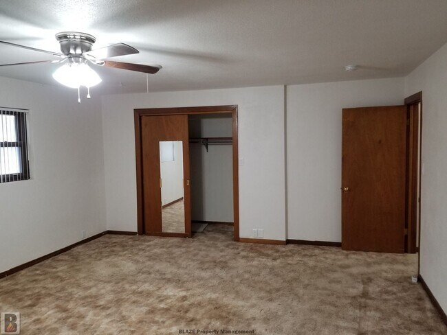 Building Photo - Massive Corner-Lot Home with Retro Charm & Shady Backyard!