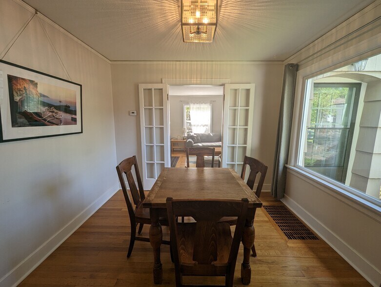 Dining room with French doors to living room - 1544 Southeast Tolman Street