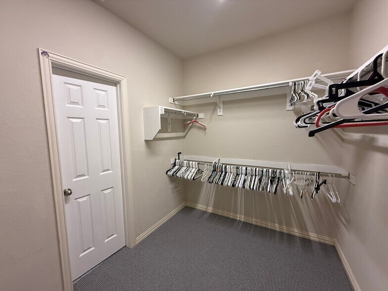 Main bedroom walk in closet - 2489 Yuma Dr