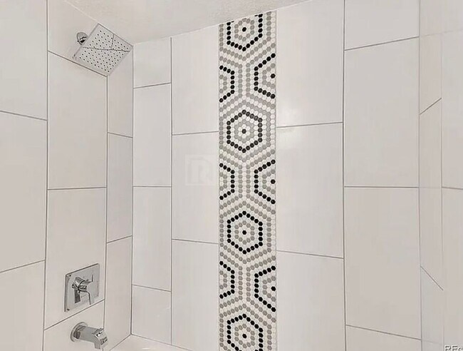 Building Photo - 7110 E 63rd Ave