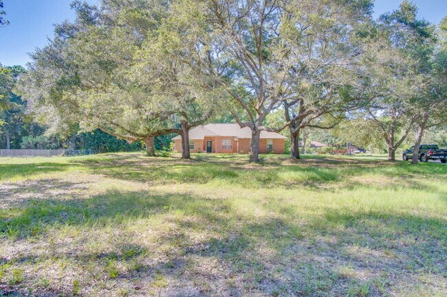 Building Photo - West Pensacola 3BR, 2BA Brick Home Near NAS Pensacola with Screened Porch, Spacious Kitchen & Ope...