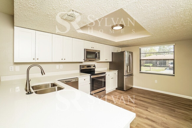 Building Photo - Lease today! No extra charge for contentment and relaxation!