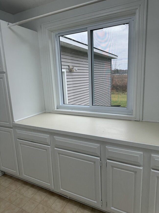 Laundry room, tons of storage and folding area - 465 N Burkhart Rd