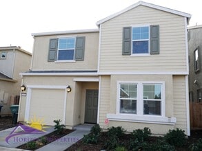 Building Photo - Modern Two-Story 4 Bed 2.5 Bath 1,807 sqft...
