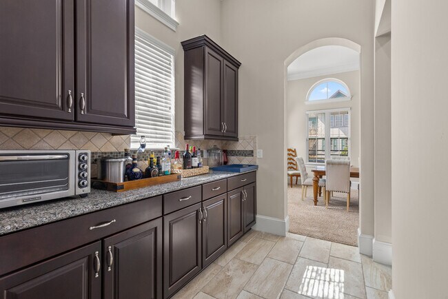 Building Photo - Luxury Waterfront Pool Home in Laureate Park | 4BR + Water Views