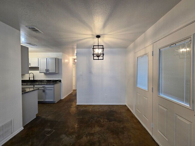 Building Photo - RENT REDUCTION - AVAILABLE NOW!