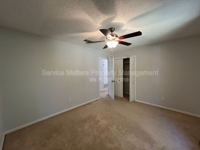 Building Photo - 6004 Players Pl