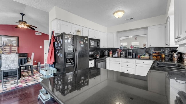 Building Photo - 708 Scarlet Sun