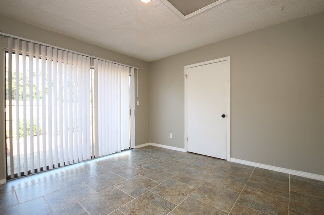 Building Photo - Southwest Pensacola Townhome Near NAS Pensacola with Granite Kitchen & Privacy-Fenced Patio