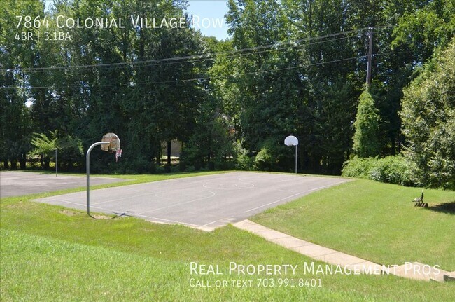 Building Photo - 7864 Colonial Village Row