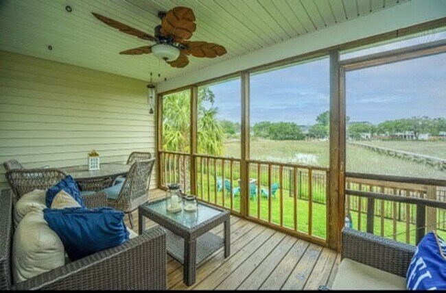 Building Photo - Gorgeous 4 BR/2BA Marshfront Home With Cre...