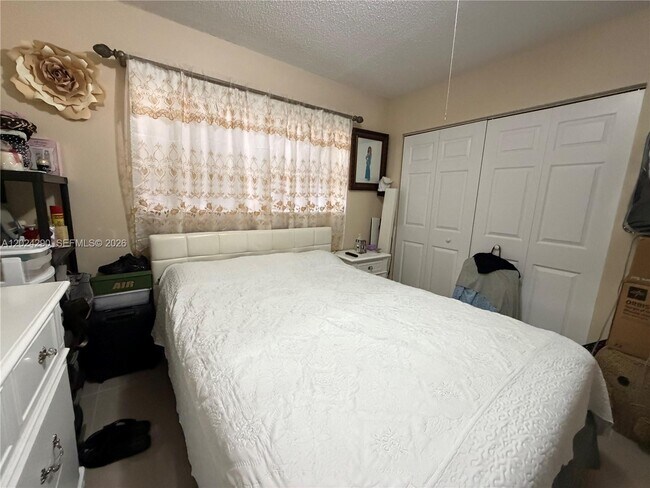 Building Photo - 5895 W 16th Ln