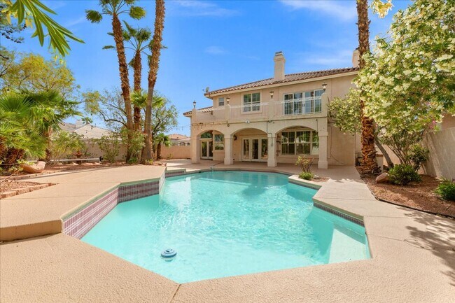 Building Photo - Expansive 4 Bedroom Home with a Pool and L...