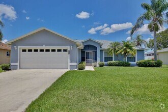 Building Photo - Beautiful 4/2 Pool Home with a Covered Pat...