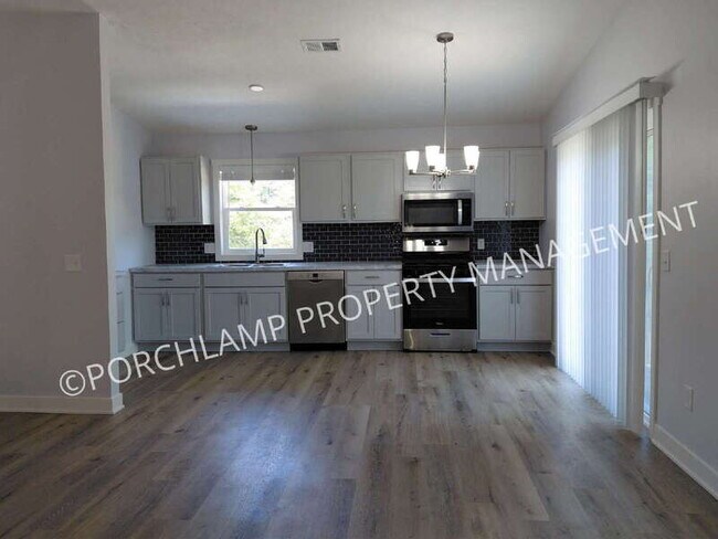 Building Photo - 6779 Pleasantview St NE