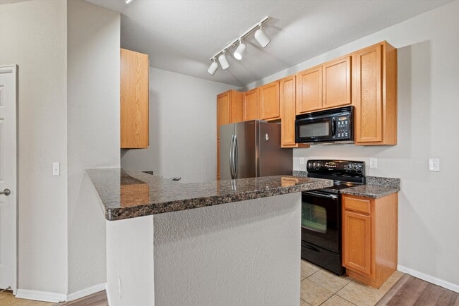 Building Photo - Pet-Friendly 2BR Condo | Private Balconies, Fireplace & Resort-Style Amenities