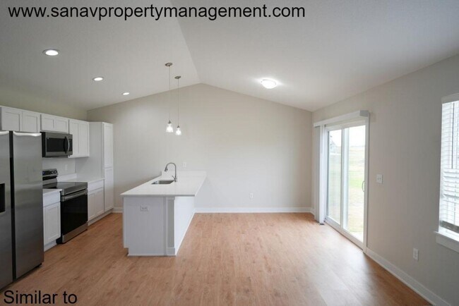 Building Photo - "Contemporary Ranch-Style Living: Immacula...