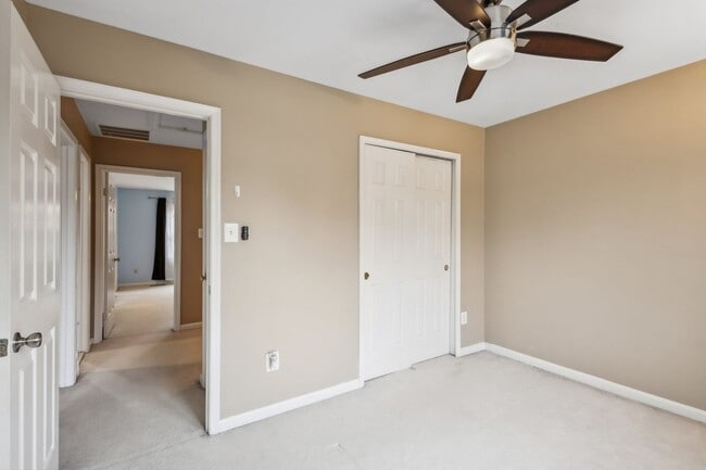 Building Photo - Modern Brick End-Unit Townhome with Stunning Upgrades and Serene Wooded Views