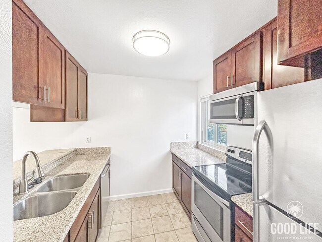 Building Photo - Bright 2BR Condo with New Carpet, Private Balcony & Great Amenities in Clairemont Mesa! $500 off ...