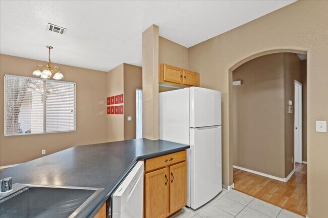 Building Photo - Charming Centennial Hills Home with Hardwood Floors & Covered Patio