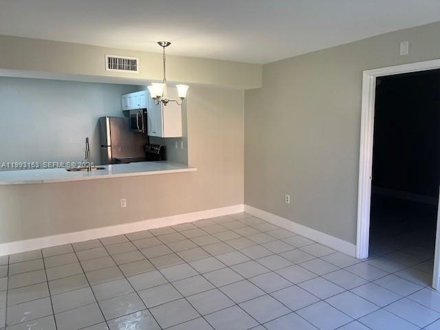 Building Photo - 6395 W 27th Ct