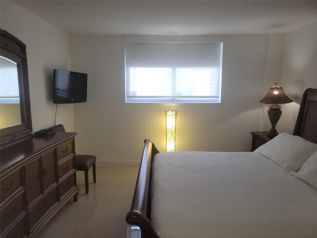 Building Photo - 19370 Collins Ave