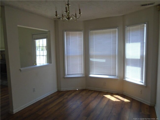 Building Photo - 5595 Quietwood Pl