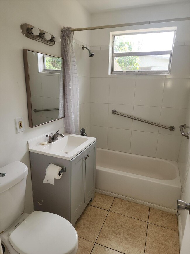 Building Photo - 5999 NW 42nd Ave