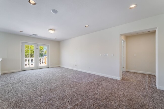 Building Photo - Beautiful Three Story, Five Bedroom Home with Lagoon Style Pool and Spa