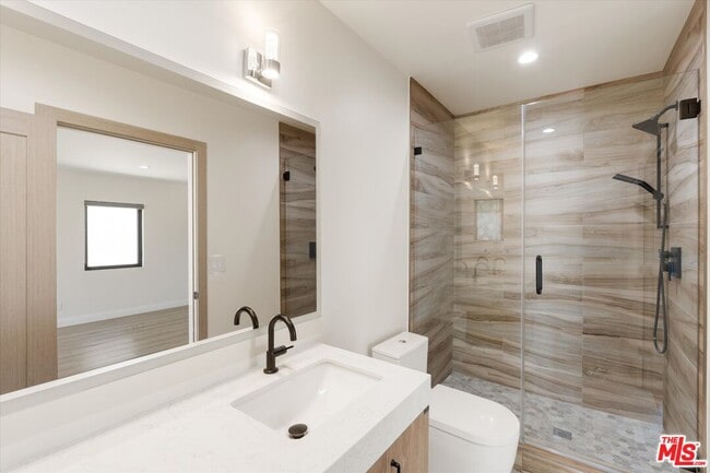 Building Photo - 11700 Woodley Ave