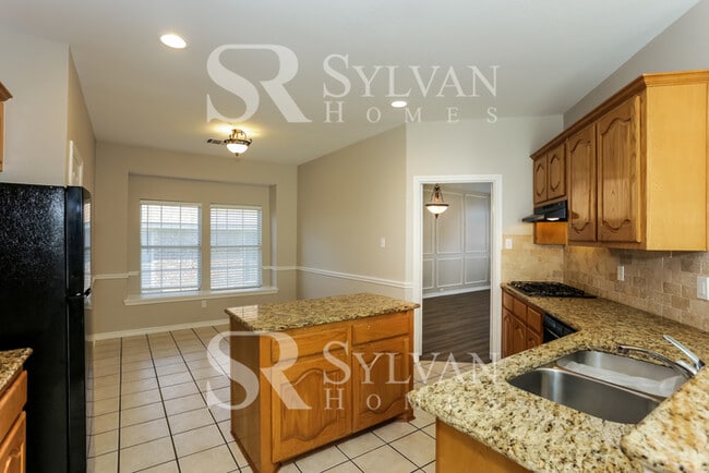 Building Photo - You Can Afford to Dwell Well.