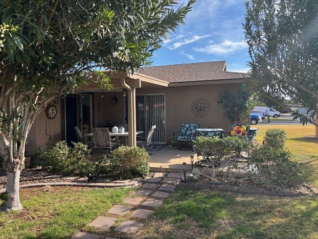 Building Photo - Welcome to this stunning updated 2-bedroom, 2-bathroom home on a lake located in the vibrant comm...