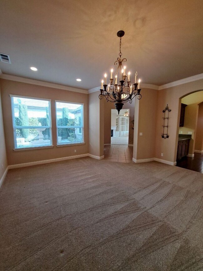 Building Photo - Custom Clovis Residence in Gated Community | Spacious Layout & 3-Car Garage!
