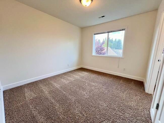 Building Photo - NEWLY RENOVATED! Spacious 2-Bedroom Townhome in a Charming Cul-de-Sac!