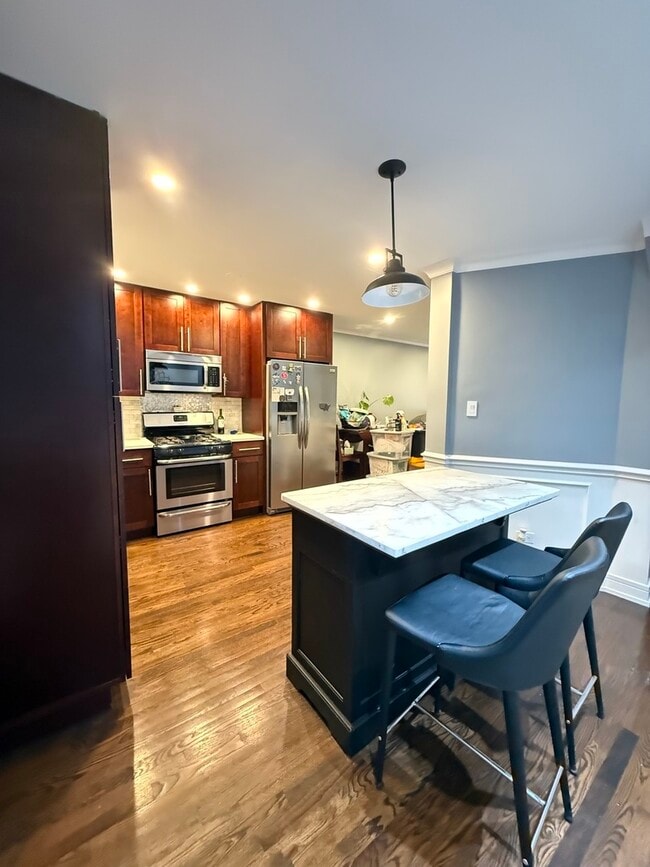 Building Photo - 6415 S Lorel Ave