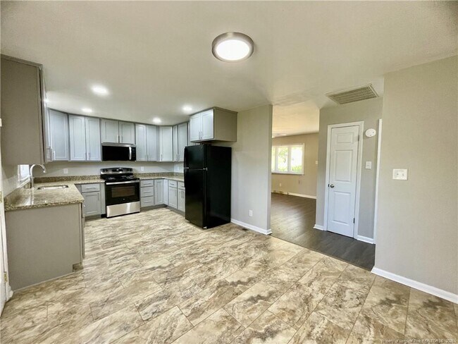 Building Photo - 6005 Blairmore Pl