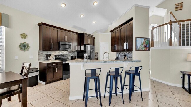 Building Photo - 8176 Fan Palm Way