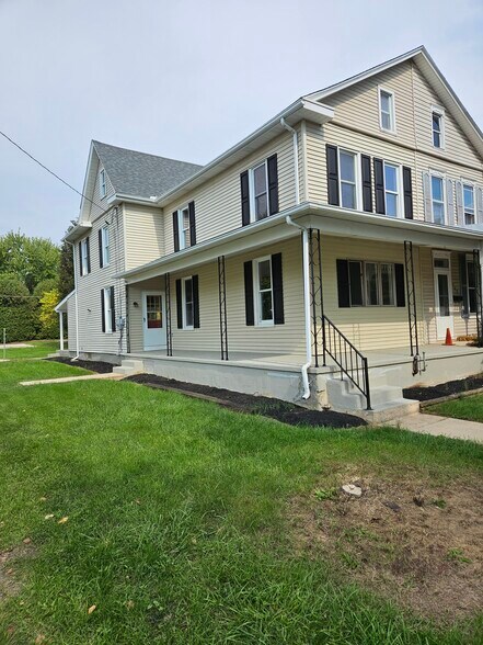 Side of house and side yard. Parking available on the alley and street. - 149 W Sheridan Ave