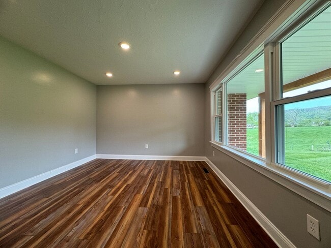 Building Photo - Exquisite Brick Ranch with Modern Upgrades, Countryside Charm And Two Car Garage