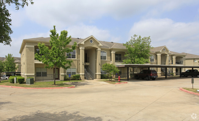 Building Photo - The Lodge at Lost Pines Apartments