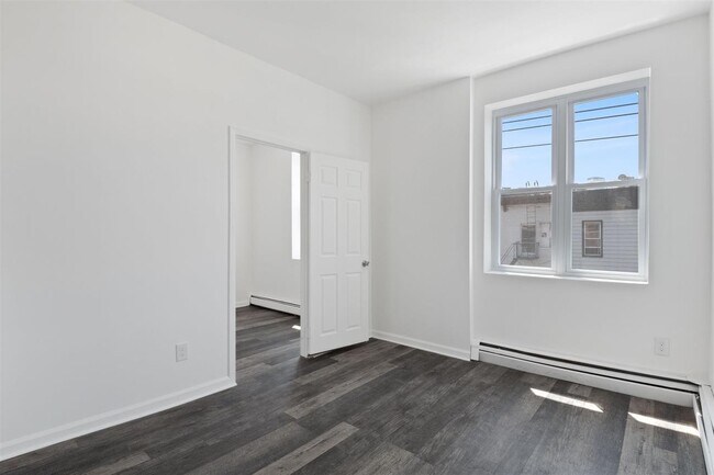 Building Photo - 310 Paterson Plank Rd