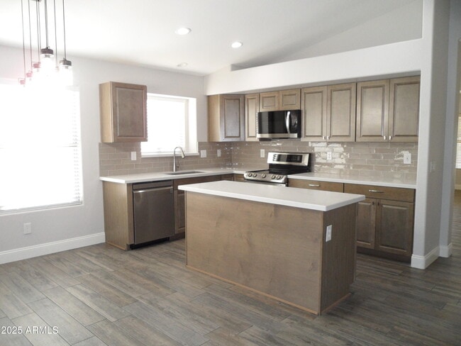 Building Photo - 7864 E Osage Ave