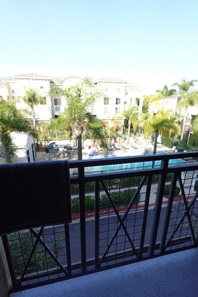 Patio overlooking pool in the kitchen - 8894 Spectrum Center Blvd