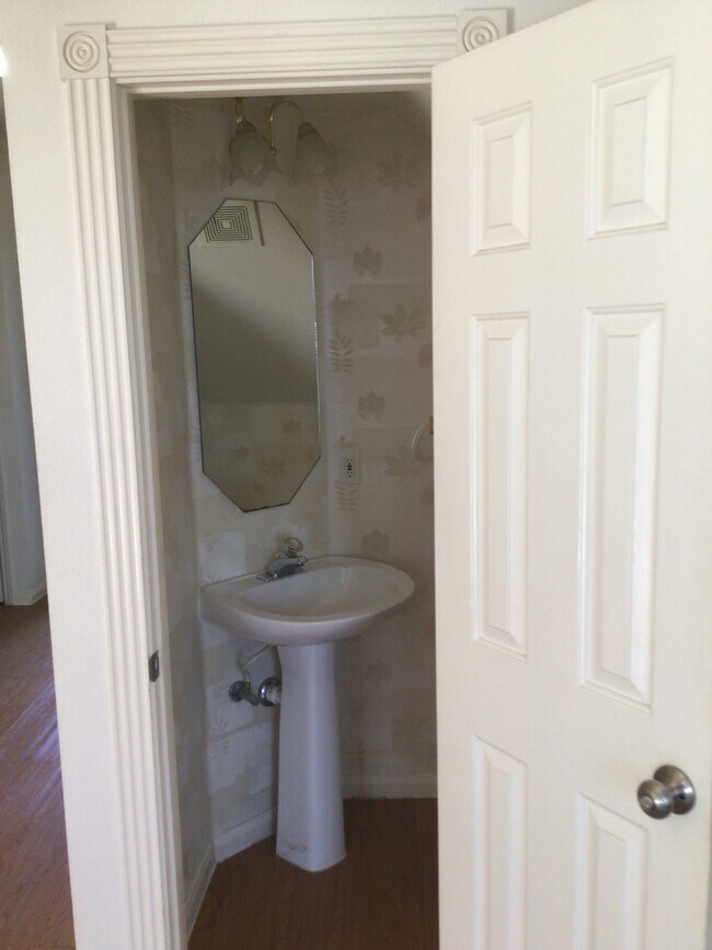 HALF BATH DOWNSTAIRS - 2913 Whisper Oaks Ln