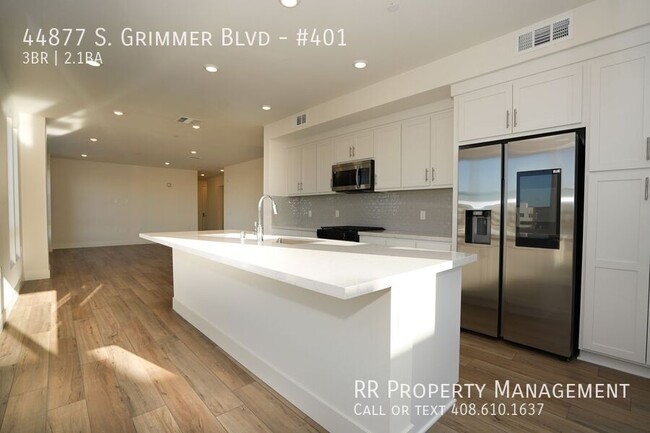 Building Photo - Brand New Top Floor Condo in Excellent Fre...