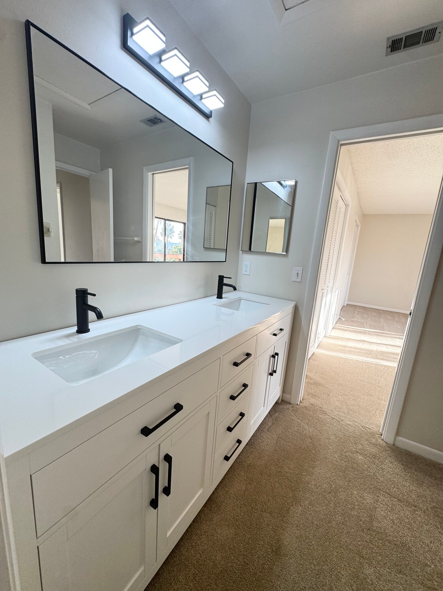 Newly Renovated Primary Bathroom - 200 S Banana River Blvd